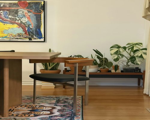 clean minimalist desk setup with plant